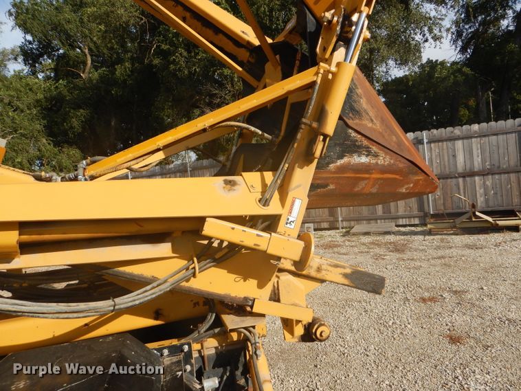 image for item DD4457 1991 Ford F600 truck with Vermeer tree spade