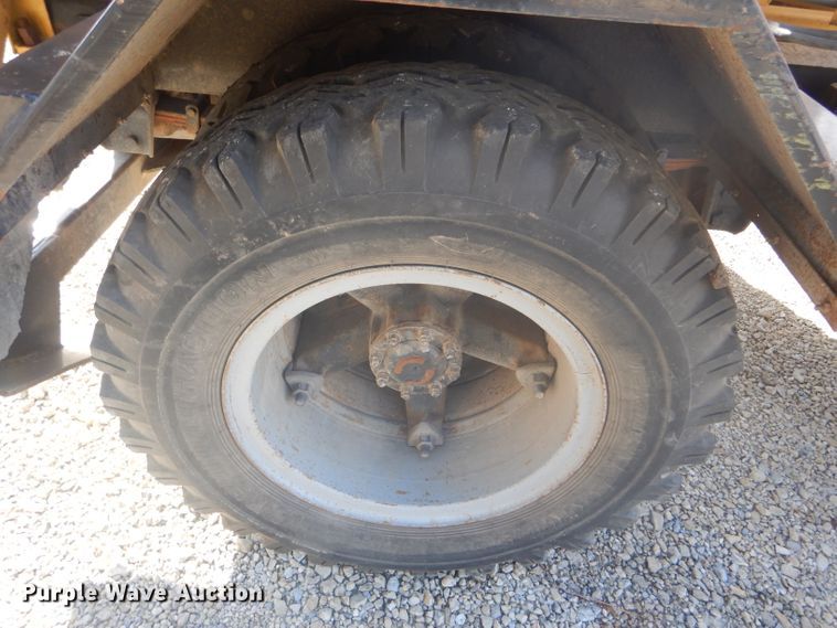 image for item DD4457 1991 Ford F600 truck with Vermeer tree spade