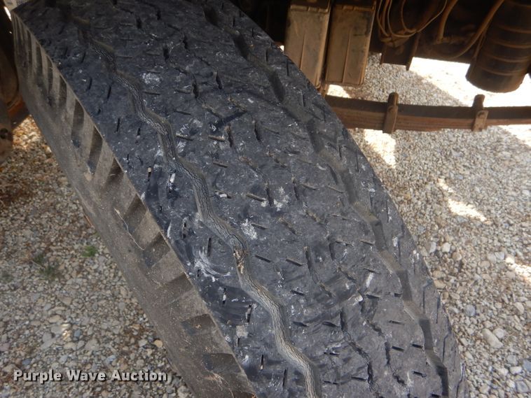 image for item DD4457 1991 Ford F600 truck with Vermeer tree spade