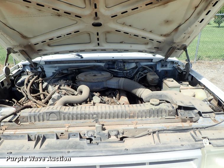 image for item DE0919 1990 Ford F450 Super Duty dump truck