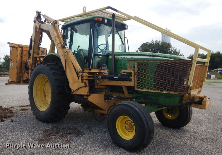 image for item DH3581 2005 John Deere 6615 tractor with Diamond side boom mower