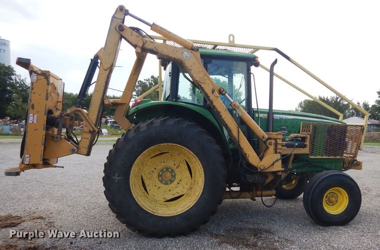 image for item DH3581 2005 John Deere 6615 tractor with Diamond side boom mower