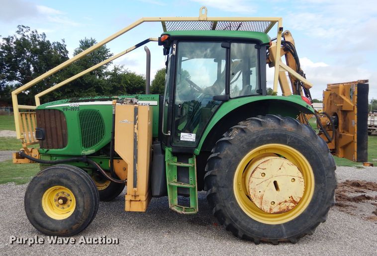 image for item DH3581 2005 John Deere 6615 tractor with Diamond side boom mower