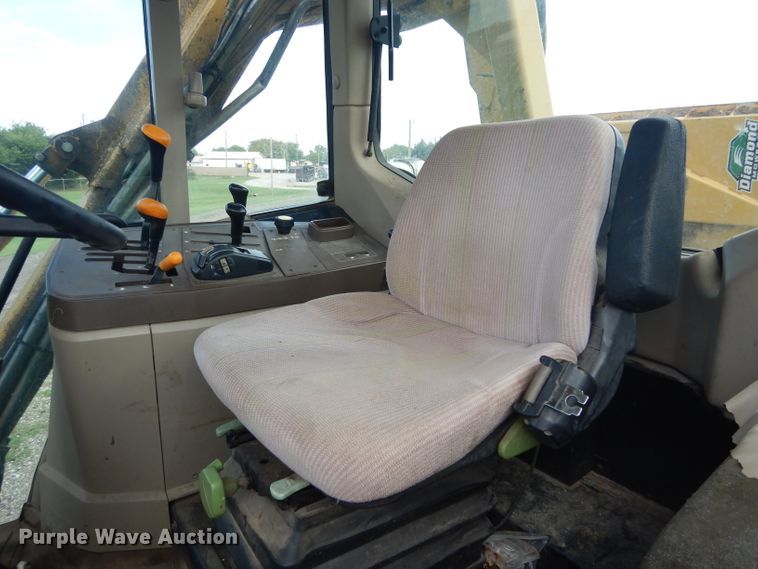 image for item DH3581 2005 John Deere 6615 tractor with Diamond side boom mower