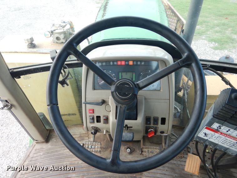 image for item DH3581 2005 John Deere 6615 tractor with Diamond side boom mower