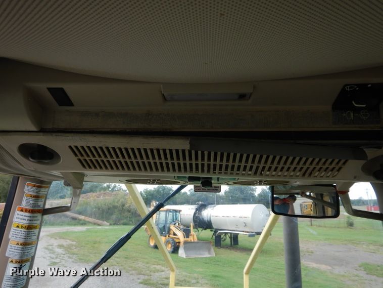 image for item DH3581 2005 John Deere 6615 tractor with Diamond side boom mower