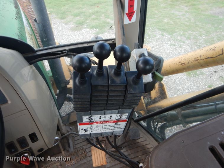 image for item DH3581 2005 John Deere 6615 tractor with Diamond side boom mower