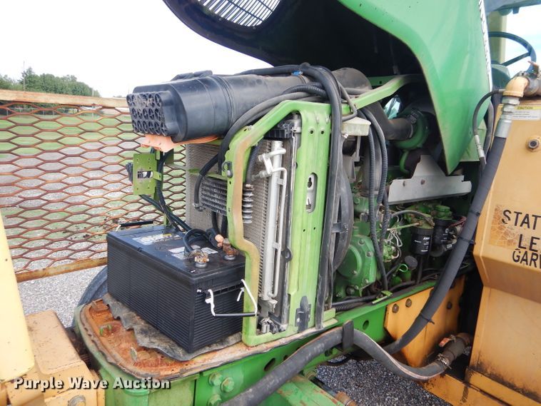 image for item DH3581 2005 John Deere 6615 tractor with Diamond side boom mower