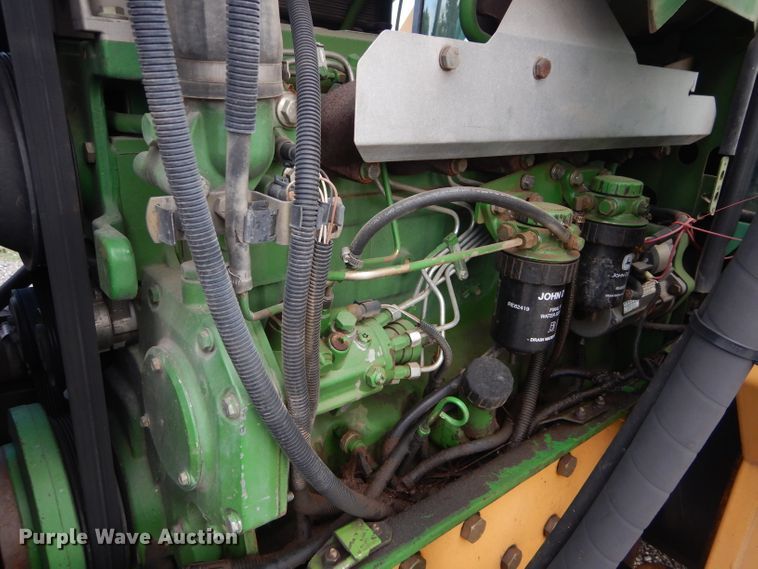 image for item DH3581 2005 John Deere 6615 tractor with Diamond side boom mower