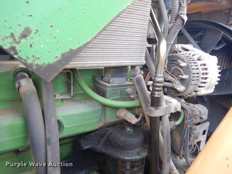 image for item DH3581 2005 John Deere 6615 tractor with Diamond side boom mower