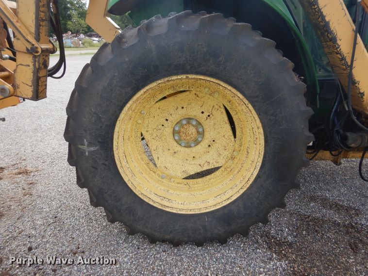 image for item DH3581 2005 John Deere 6615 tractor with Diamond side boom mower