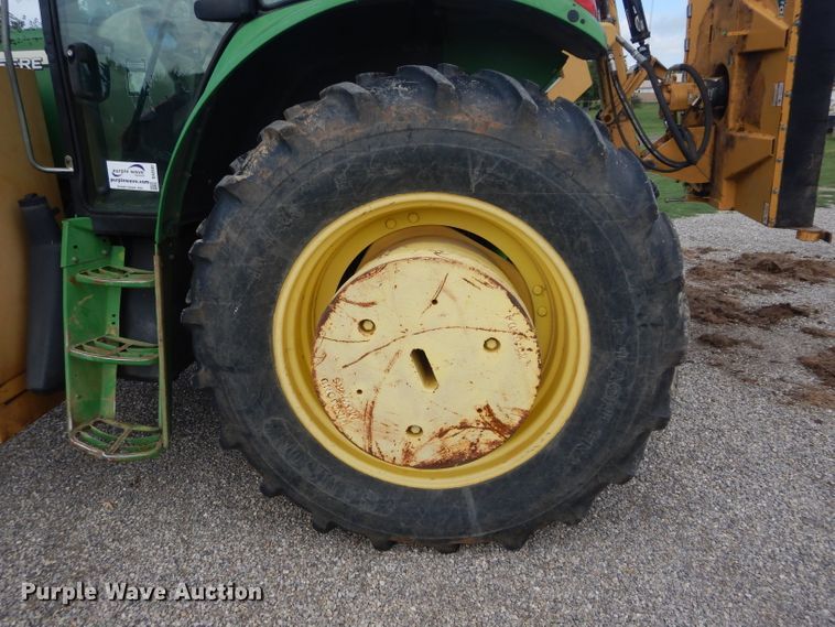 image for item DH3581 2005 John Deere 6615 tractor with Diamond side boom mower