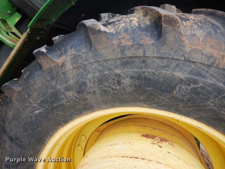 image for item DH3581 2005 John Deere 6615 tractor with Diamond side boom mower