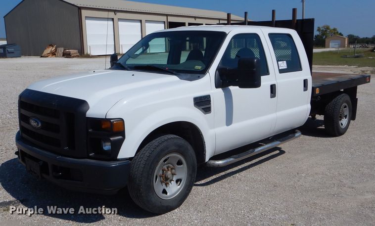 image for item DH6142 2009 Ford F250 Super Duty XL flatbed pickup truck