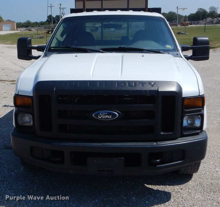image for item DH6142 2009 Ford F250 Super Duty XL flatbed pickup truck