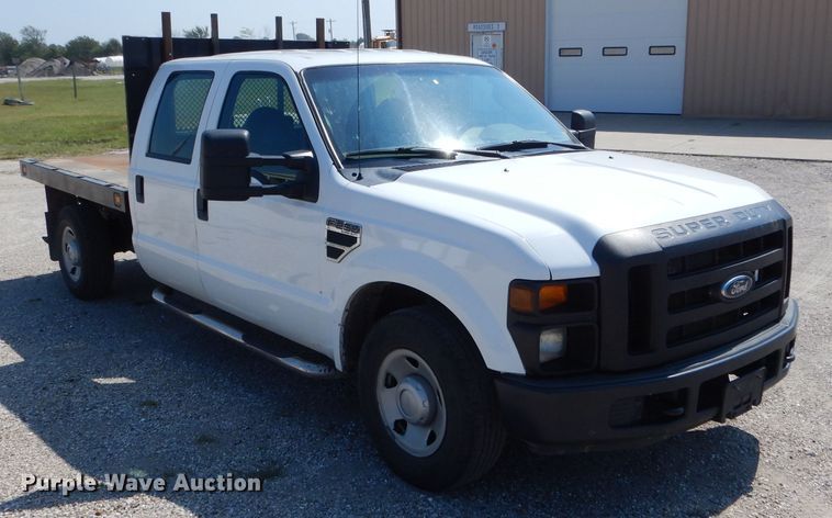 image for item DH6142 2009 Ford F250 Super Duty XL flatbed pickup truck