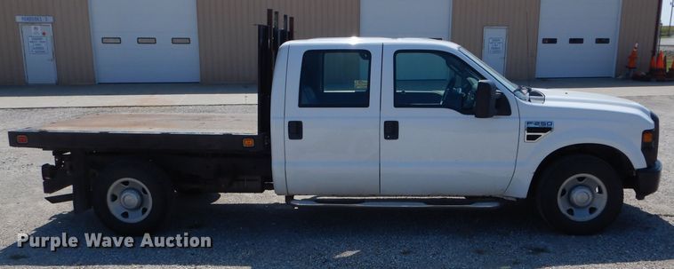 image for item DH6142 2009 Ford F250 Super Duty XL flatbed pickup truck