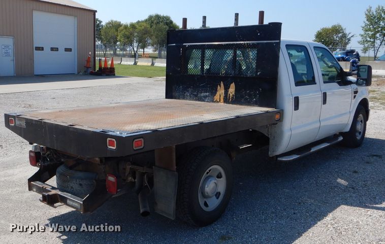image for item DH6142 2009 Ford F250 Super Duty XL flatbed pickup truck