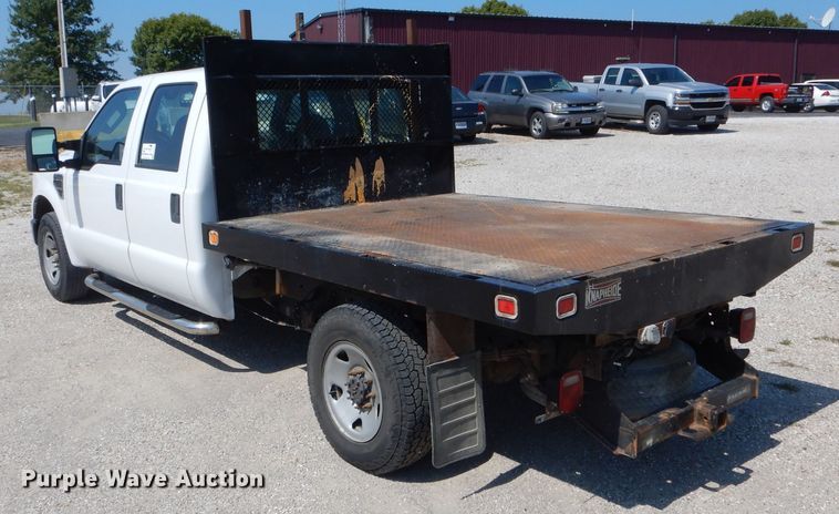 image for item DH6142 2009 Ford F250 Super Duty XL flatbed pickup truck
