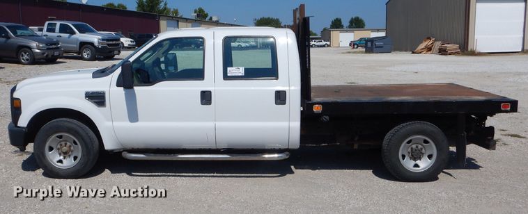 image for item DH6142 2009 Ford F250 Super Duty XL flatbed pickup truck