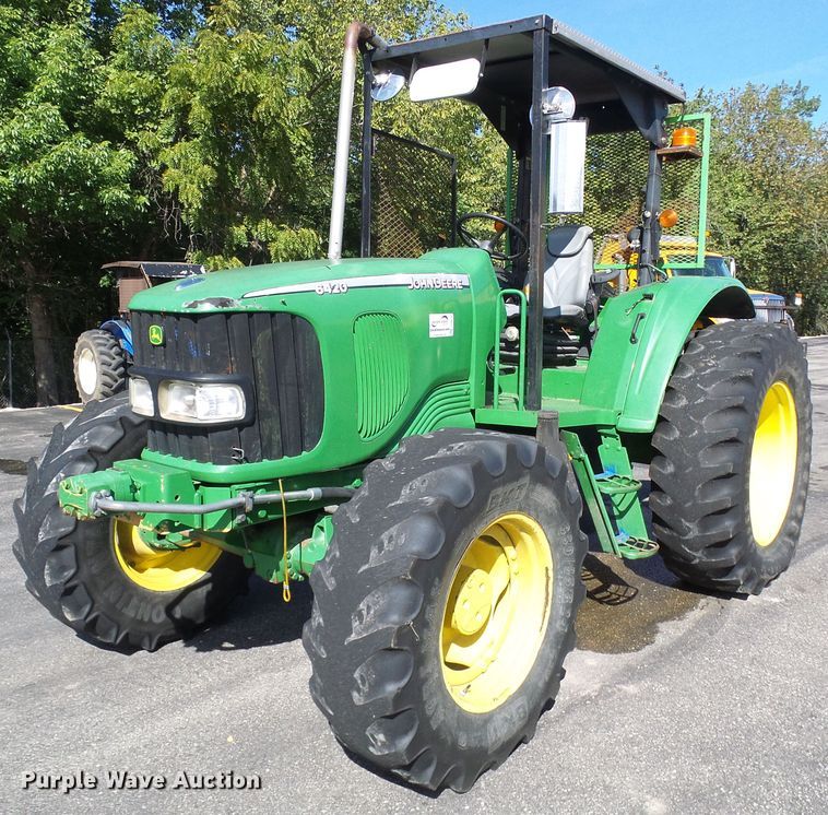 image for item DI0678 2002 John Deere 6420 MFWD tractor