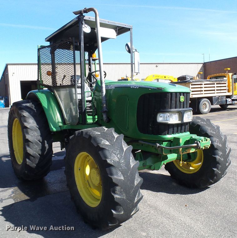 image for item DI0678 2002 John Deere 6420 MFWD tractor
