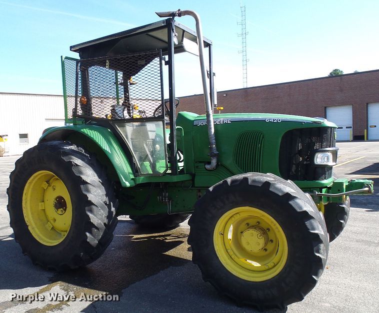 image for item DI0678 2002 John Deere 6420 MFWD tractor