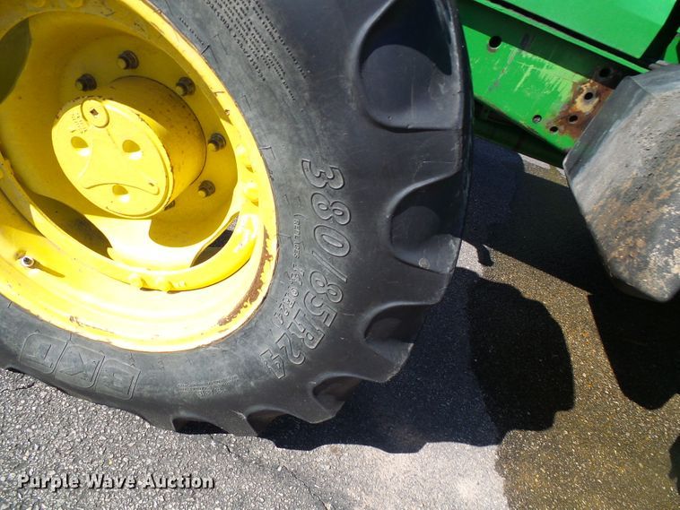 image for item DI0678 2002 John Deere 6420 MFWD tractor