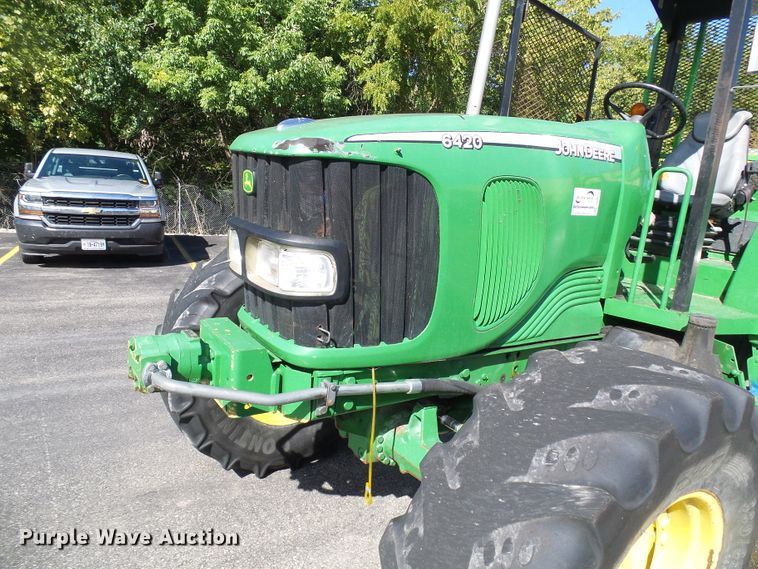 image for item DI0678 2002 John Deere 6420 MFWD tractor