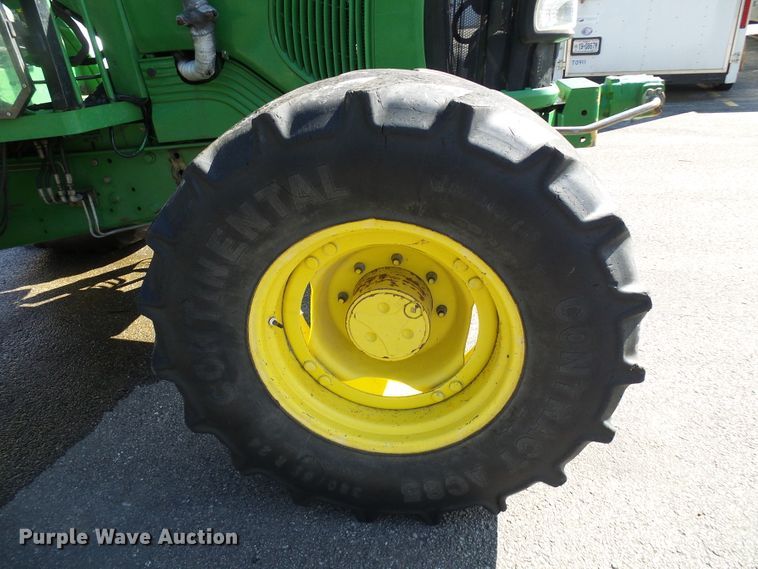 image for item DI0678 2002 John Deere 6420 MFWD tractor
