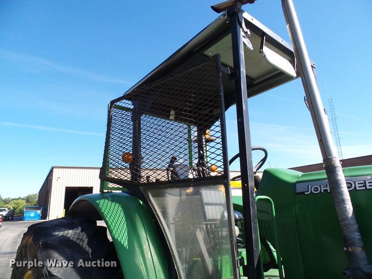 image for item DI0678 2002 John Deere 6420 MFWD tractor