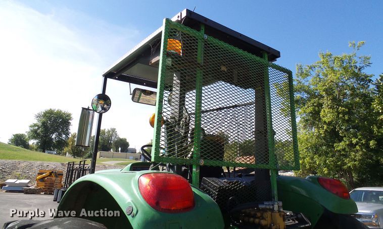 image for item DI0678 2002 John Deere 6420 MFWD tractor