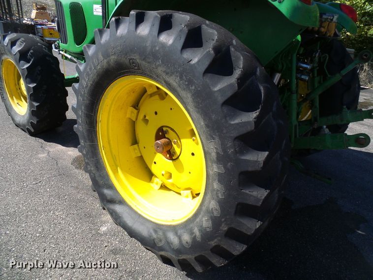image for item DI0678 2002 John Deere 6420 MFWD tractor