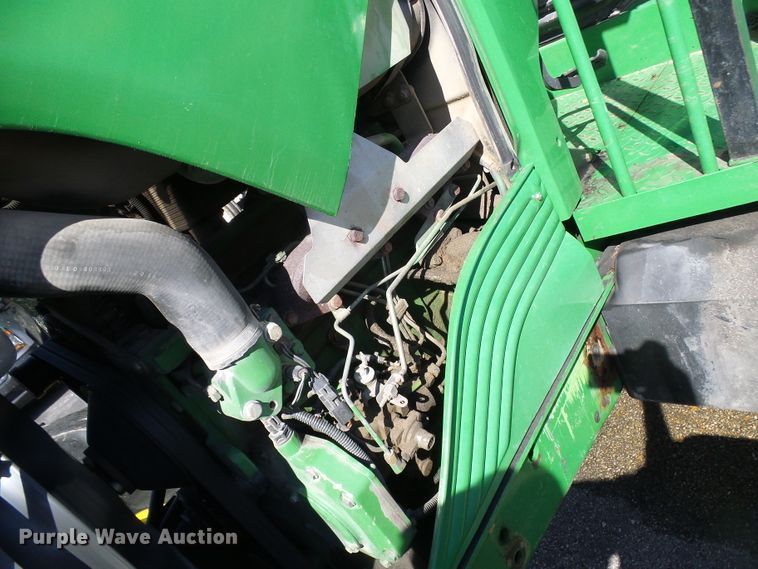 image for item DI0678 2002 John Deere 6420 MFWD tractor