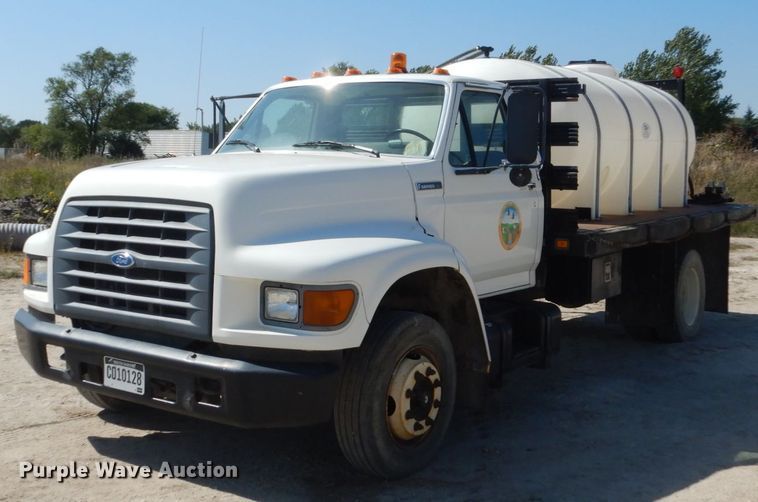 image for item FU9545 1997 Ford F700 flatbed truck with sprayer system