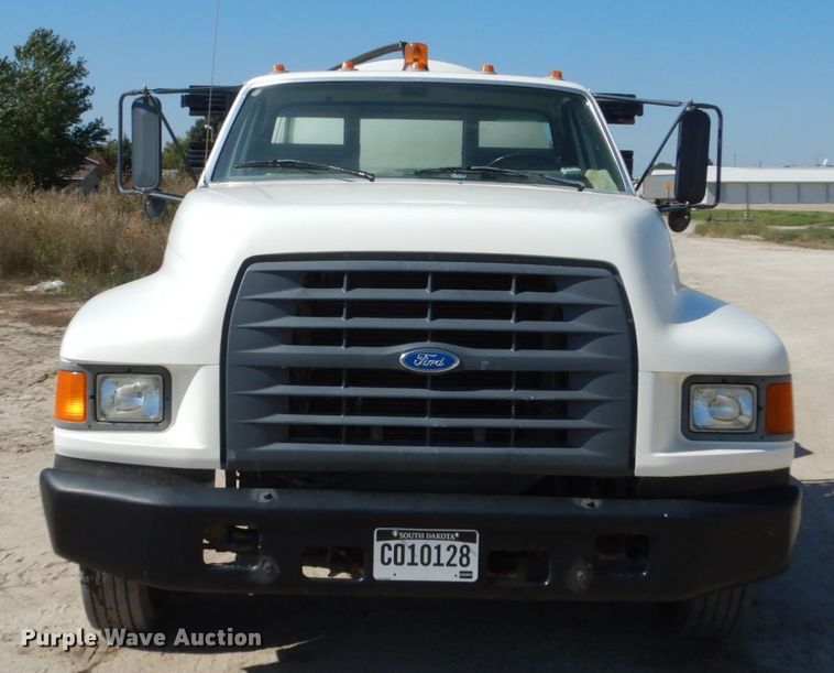 image for item FU9545 1997 Ford F700 flatbed truck with sprayer system