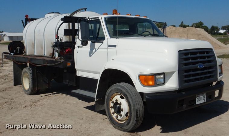 image for item FU9545 1997 Ford F700 flatbed truck with sprayer system