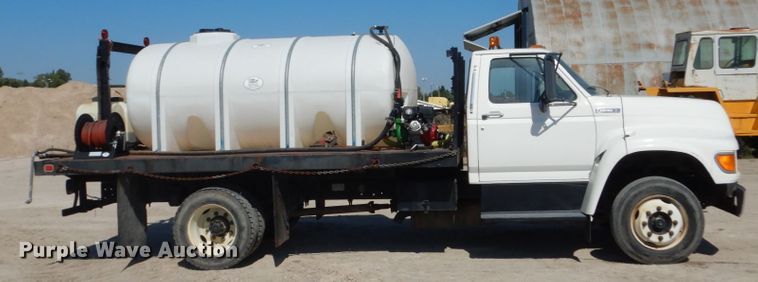 image for item FU9545 1997 Ford F700 flatbed truck with sprayer system