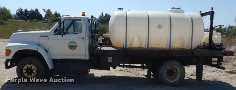 image for item FU9545 1997 Ford F700 flatbed truck with sprayer system