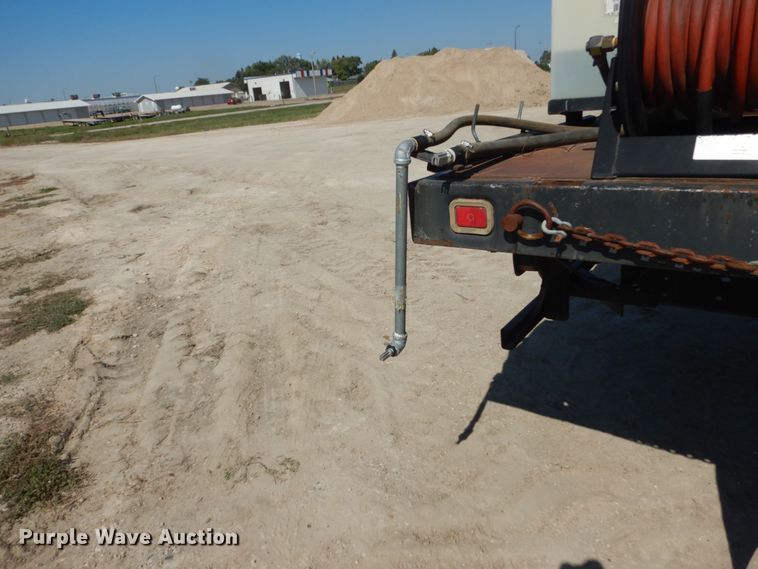 image for item FU9545 1997 Ford F700 flatbed truck with sprayer system