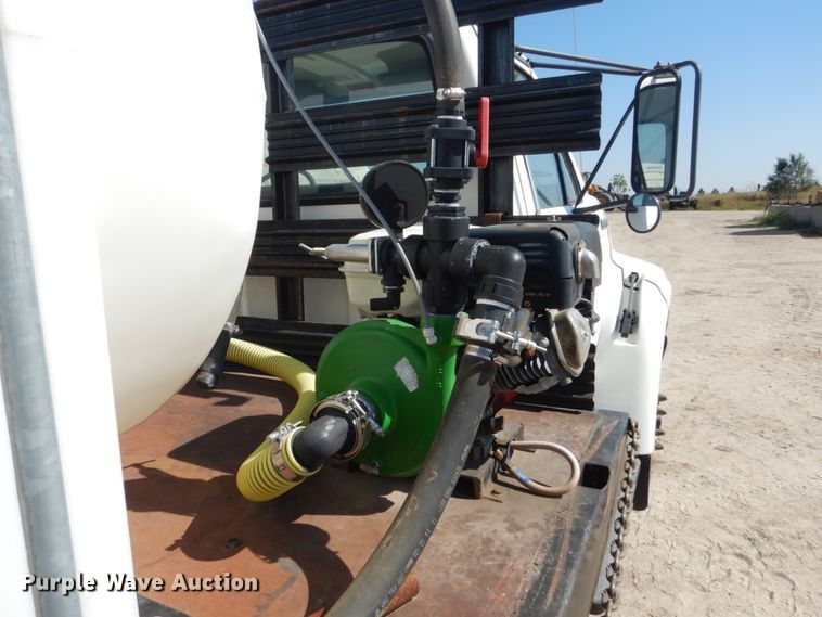 image for item FU9545 1997 Ford F700 flatbed truck with sprayer system