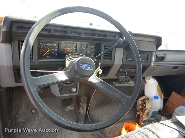 image for item FU9545 1997 Ford F700 flatbed truck with sprayer system