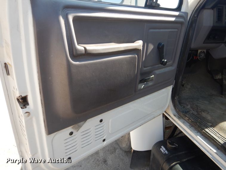 image for item FU9545 1997 Ford F700 flatbed truck with sprayer system