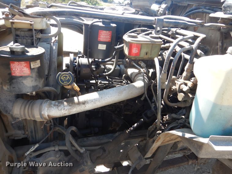 image for item FU9545 1997 Ford F700 flatbed truck with sprayer system