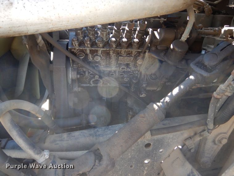 image for item FU9545 1997 Ford F700 flatbed truck with sprayer system