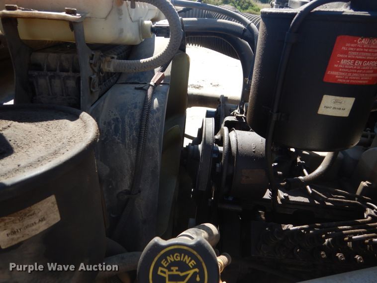 image for item FU9545 1997 Ford F700 flatbed truck with sprayer system