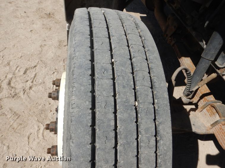 image for item FU9545 1997 Ford F700 flatbed truck with sprayer system