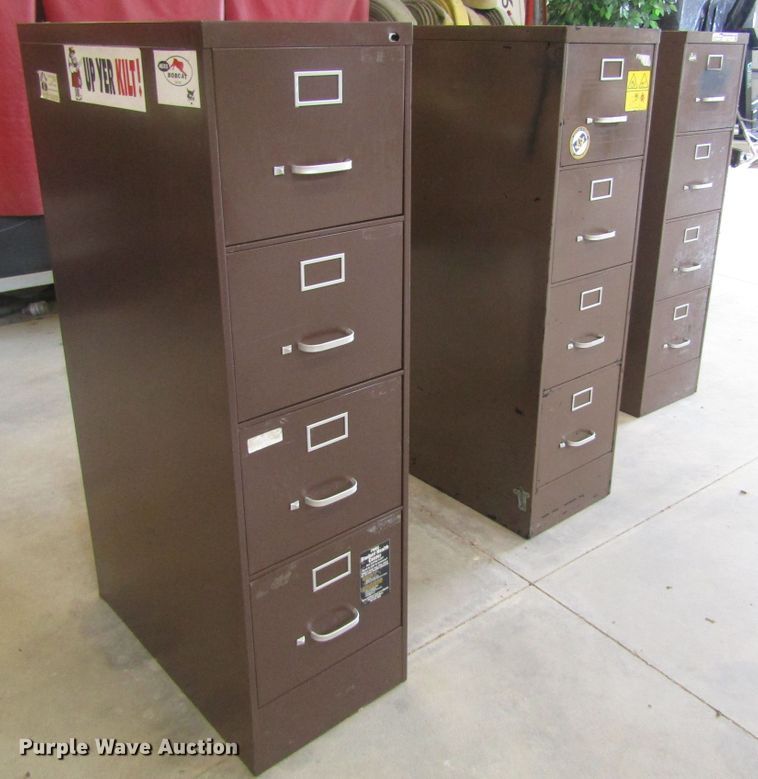 image for item GE9757 (3) four drawer metal file cabinets