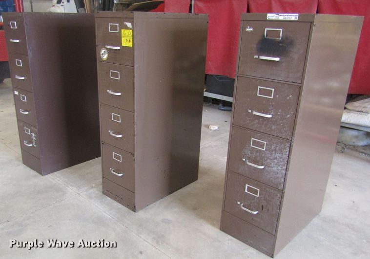 image for item GE9757 (3) four drawer metal file cabinets
