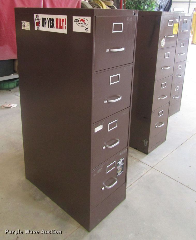 image for item GE9757 (3) four drawer metal file cabinets